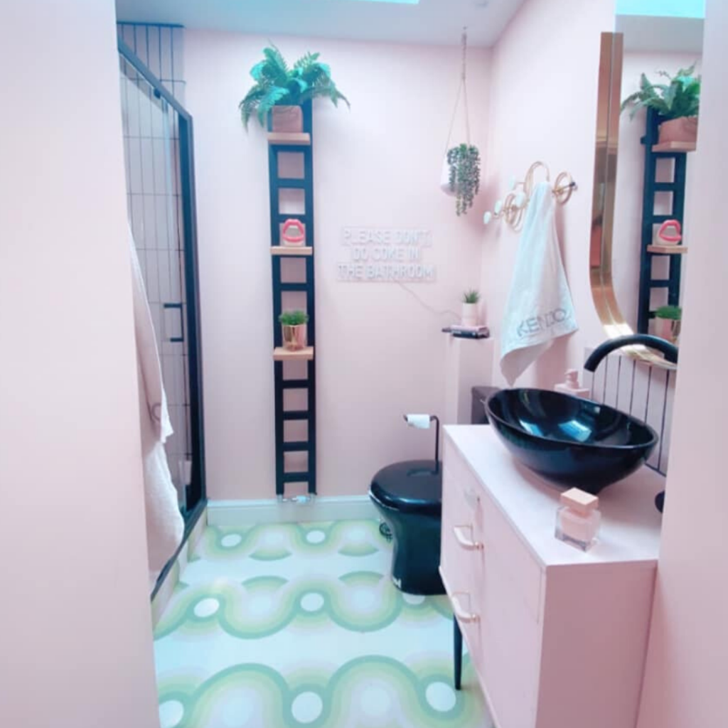 real-life barbie house bathroom with lights on