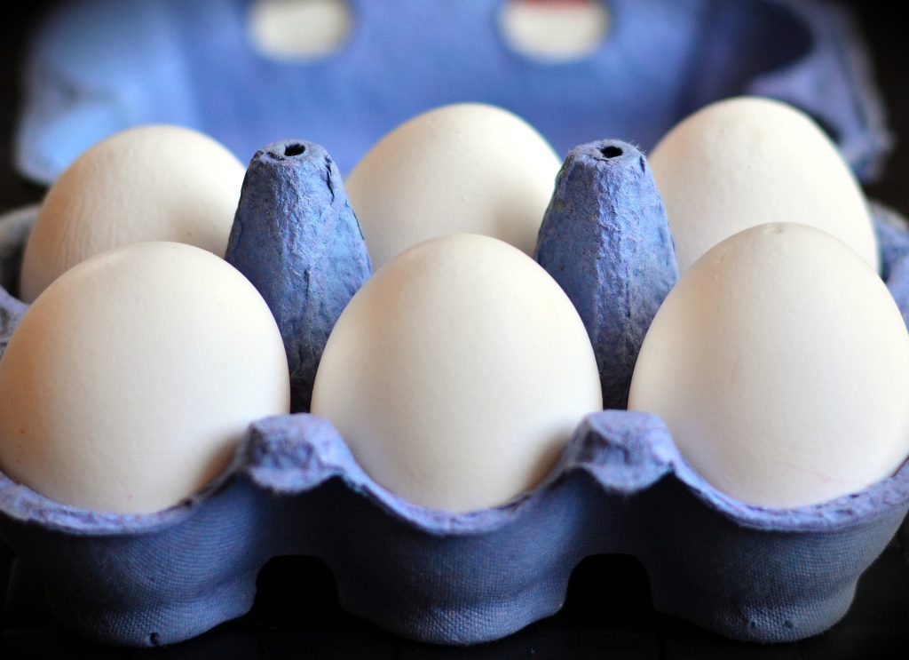 white american eggs in a blue box