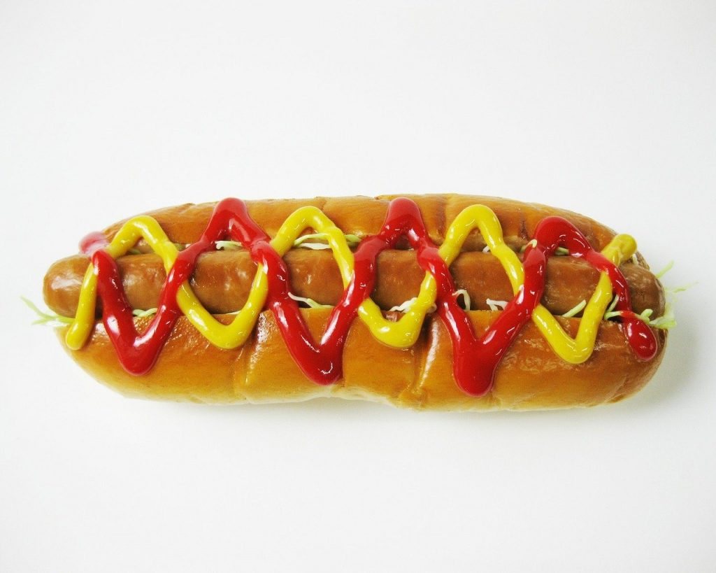 American hot dog with ketchup and mustard